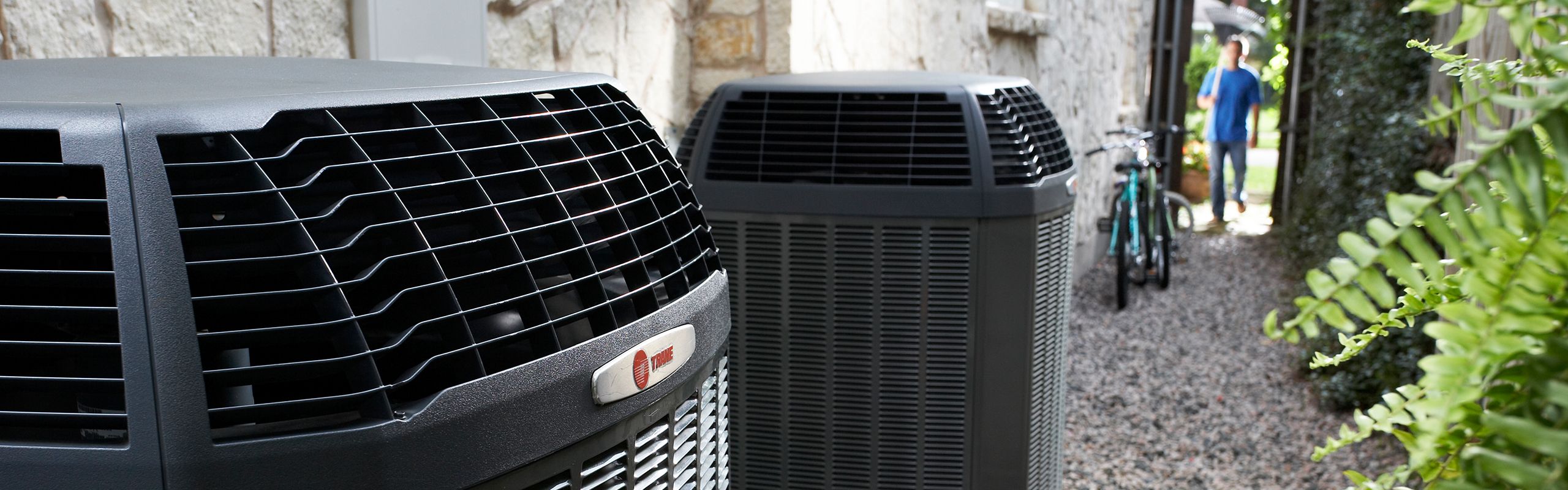 Trane air conditioner in the backyard of a home